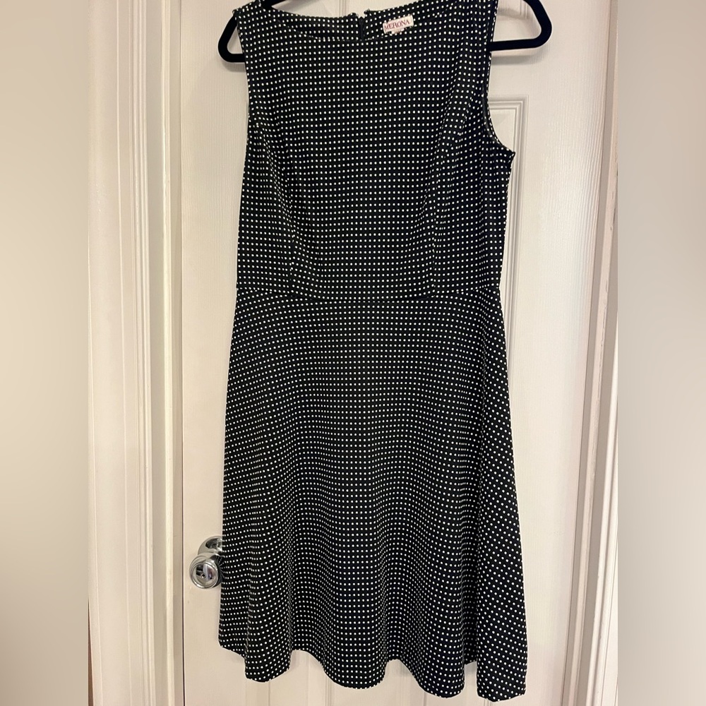 Black and white sleeveless dress with zip up back